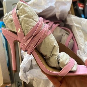 Brand new never worn Steve Madden pink heels with ties that wrap around leg